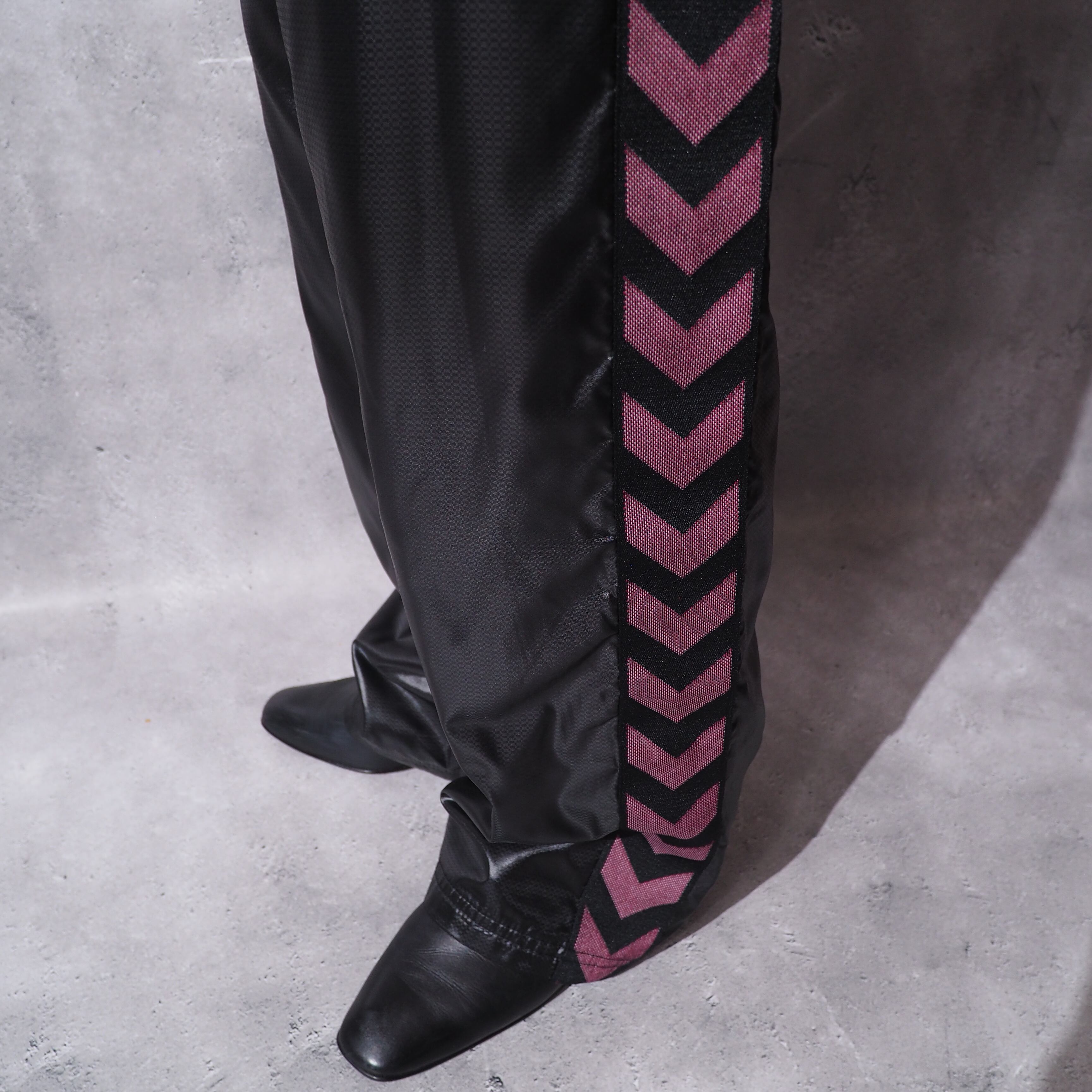 ” hummel ” arrow line × logo embroidery track gross pants