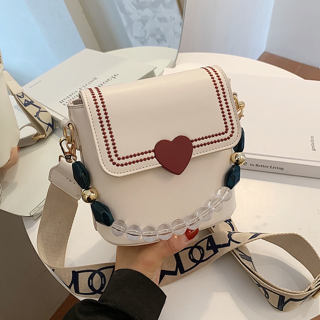 テクスチャードスモールバッグレディースバッグ2020人気の新しいトレンディなファッションシングルショルダーバッグネットセレブオールマッチメッセンジャーバケットバッグ Tiancai_Wing_Bag1409492