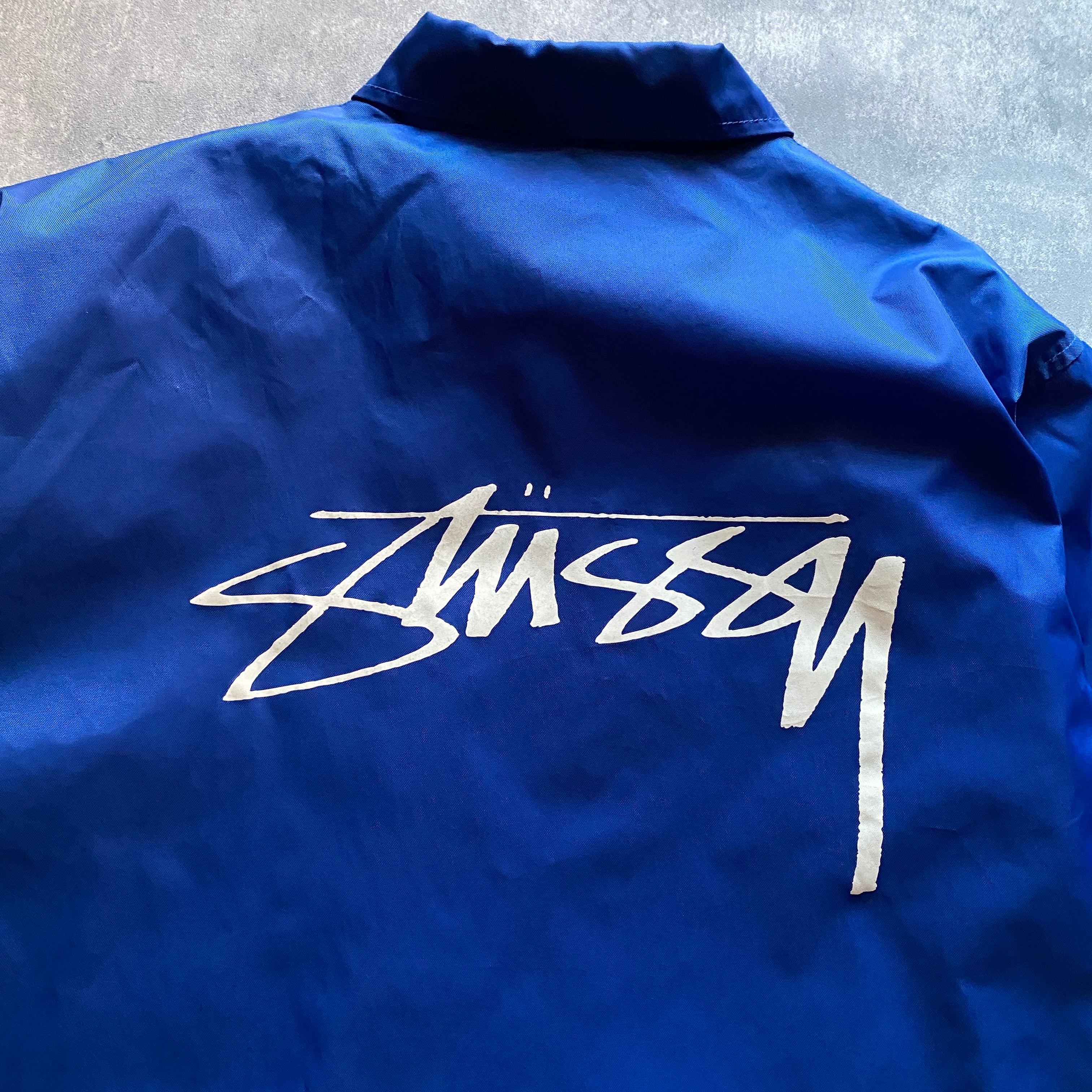 stussy ステューシー 刺繍ワンポイント バックプリント ブルー