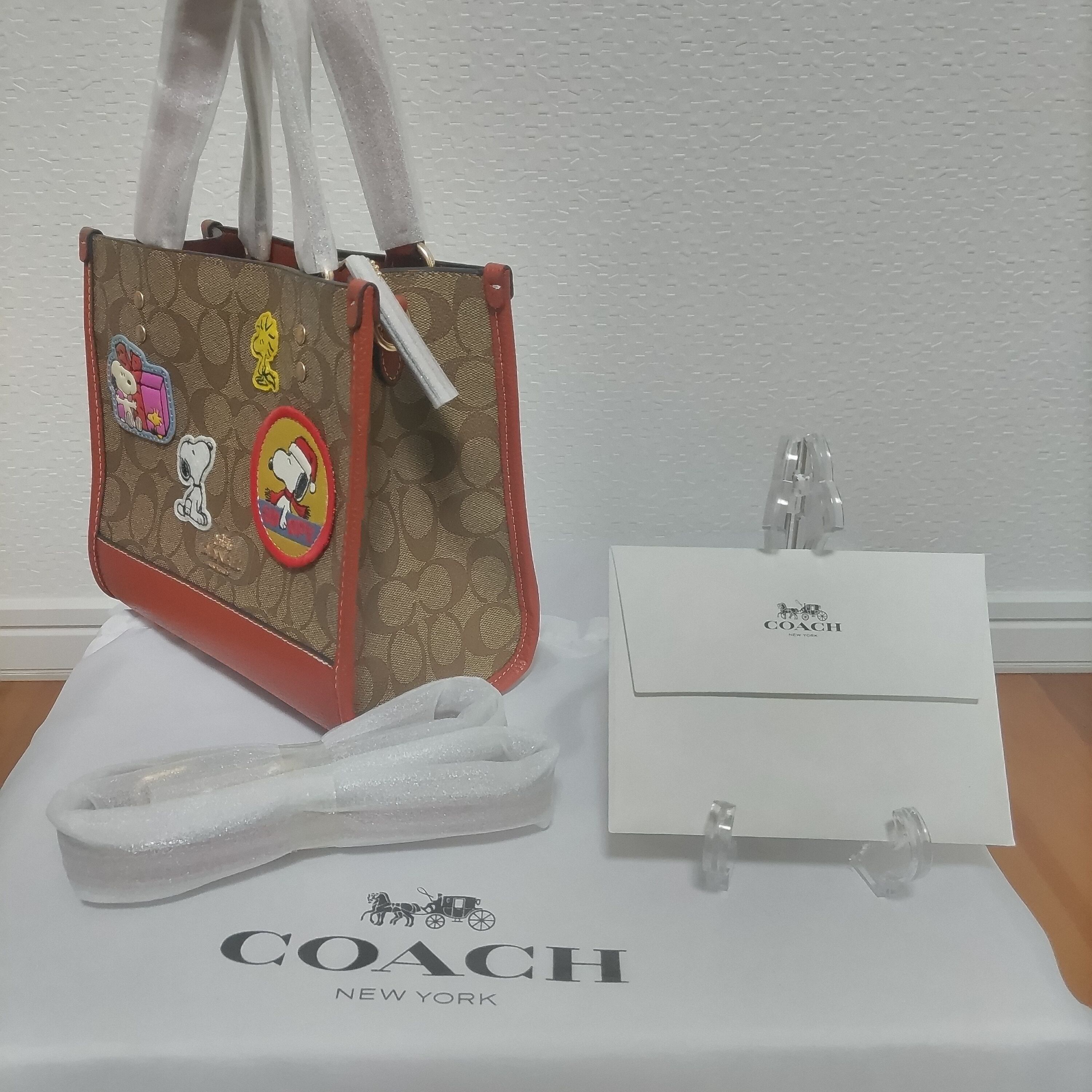 COACH コーチ スヌーピー コラボ トートバッグ 新作 デンプシートート