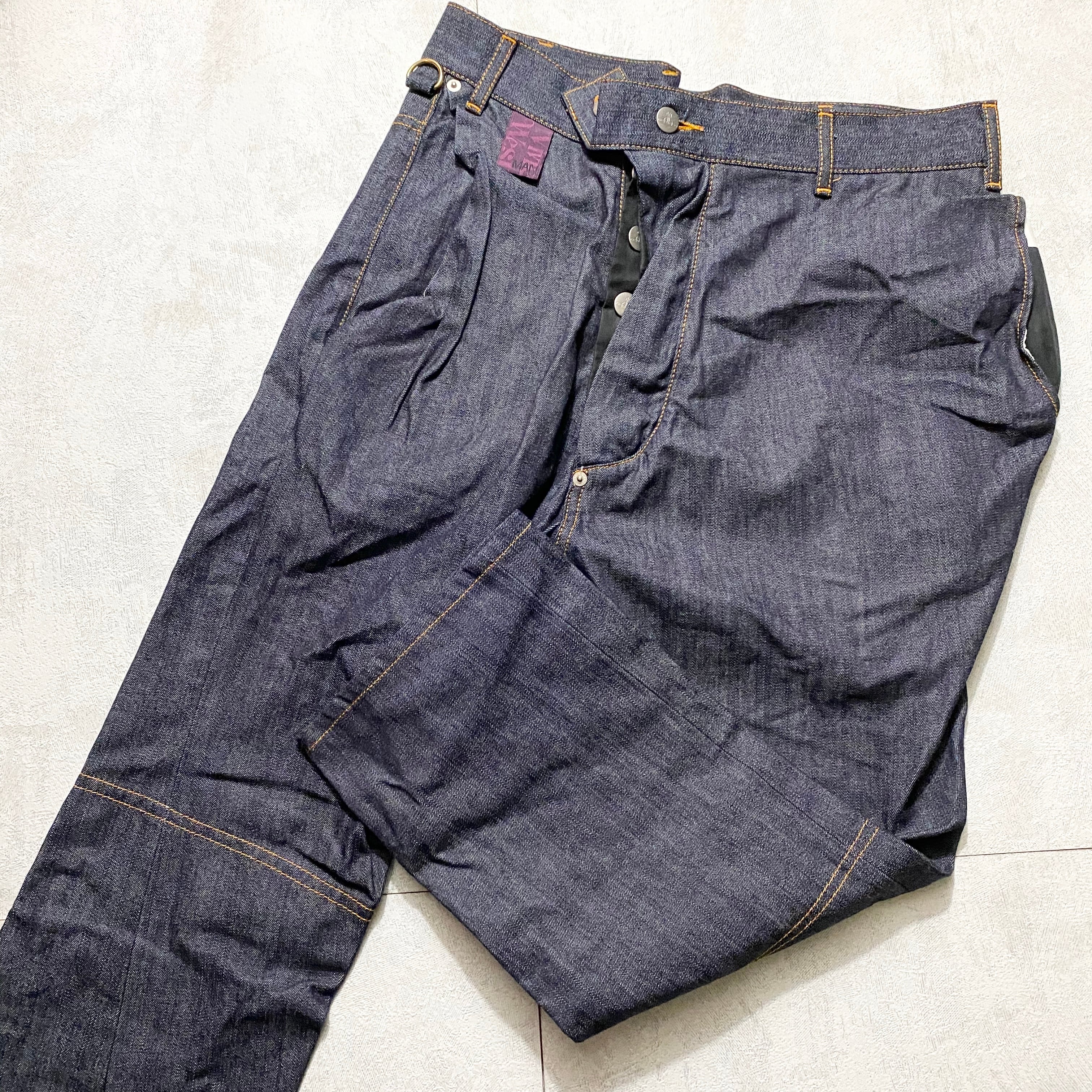 VIVIENNE WESTWOOD MAN asymmetric denim pants | NOIR ONLINE