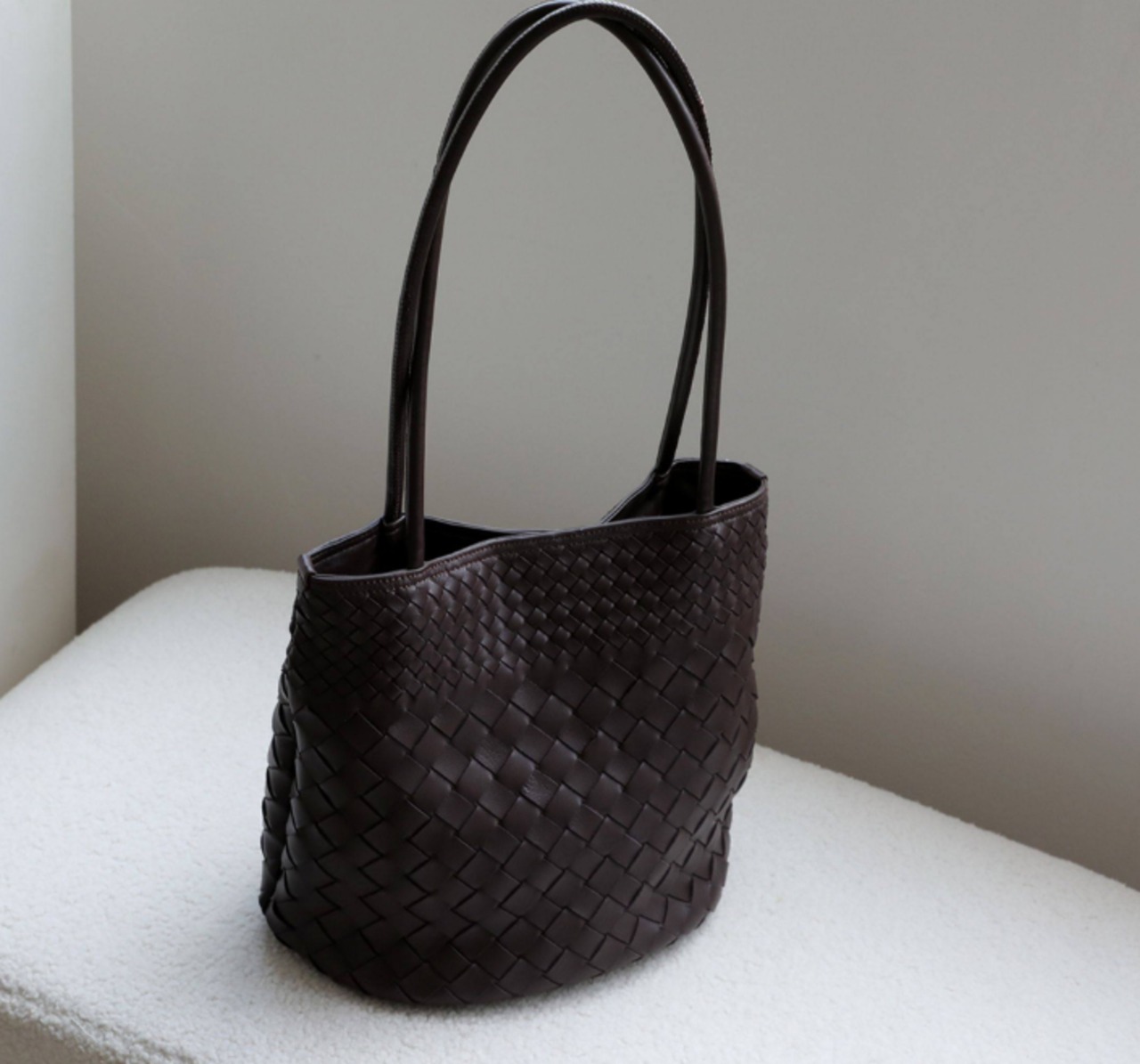 羊革編み込みバケットバッグ