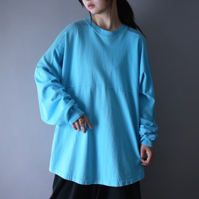 shoulder and sleeve switching mesh design back printed over silhouette souvenir l/s tee