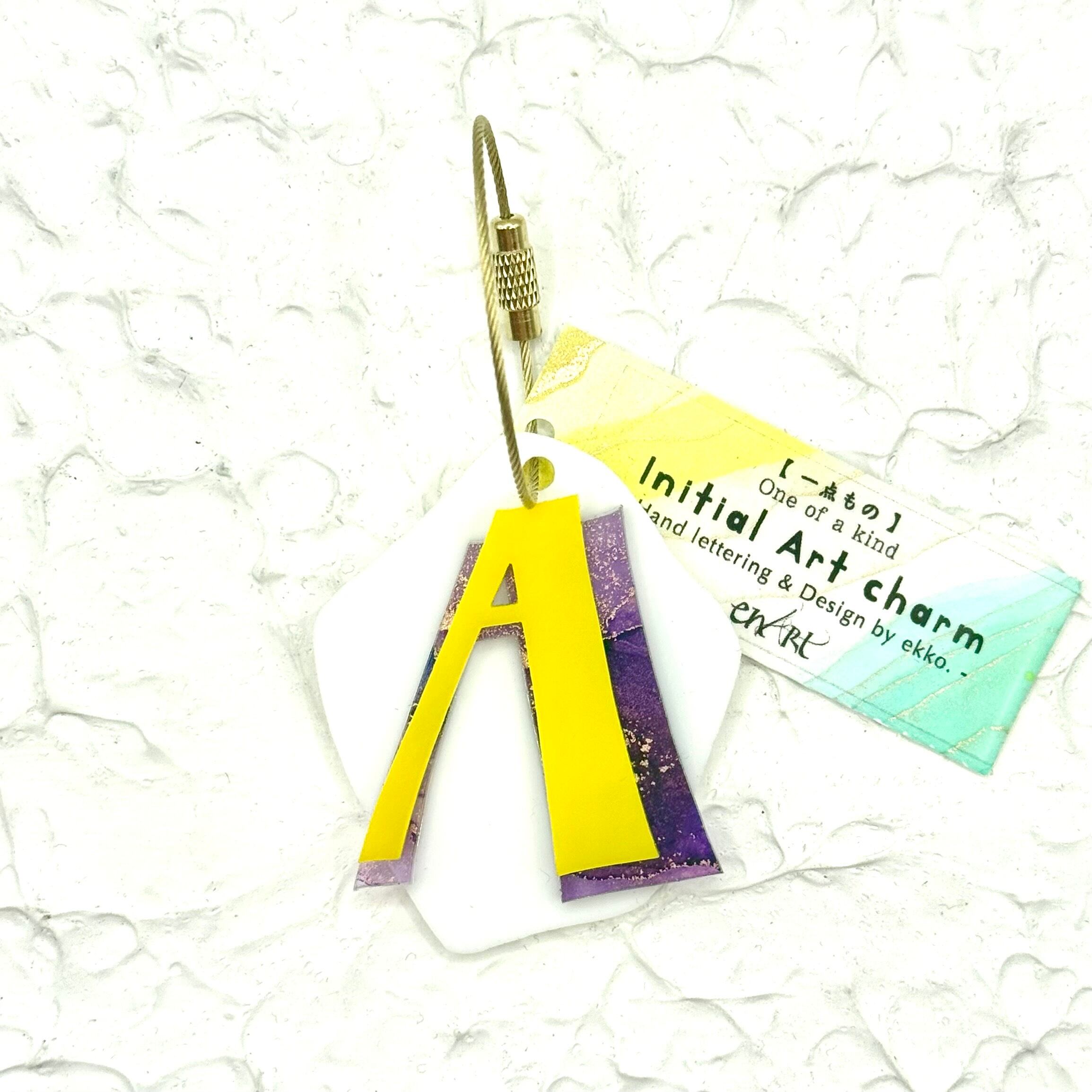 グロス♢イニシャルチャーム [ A ] Yellow × Purple × White