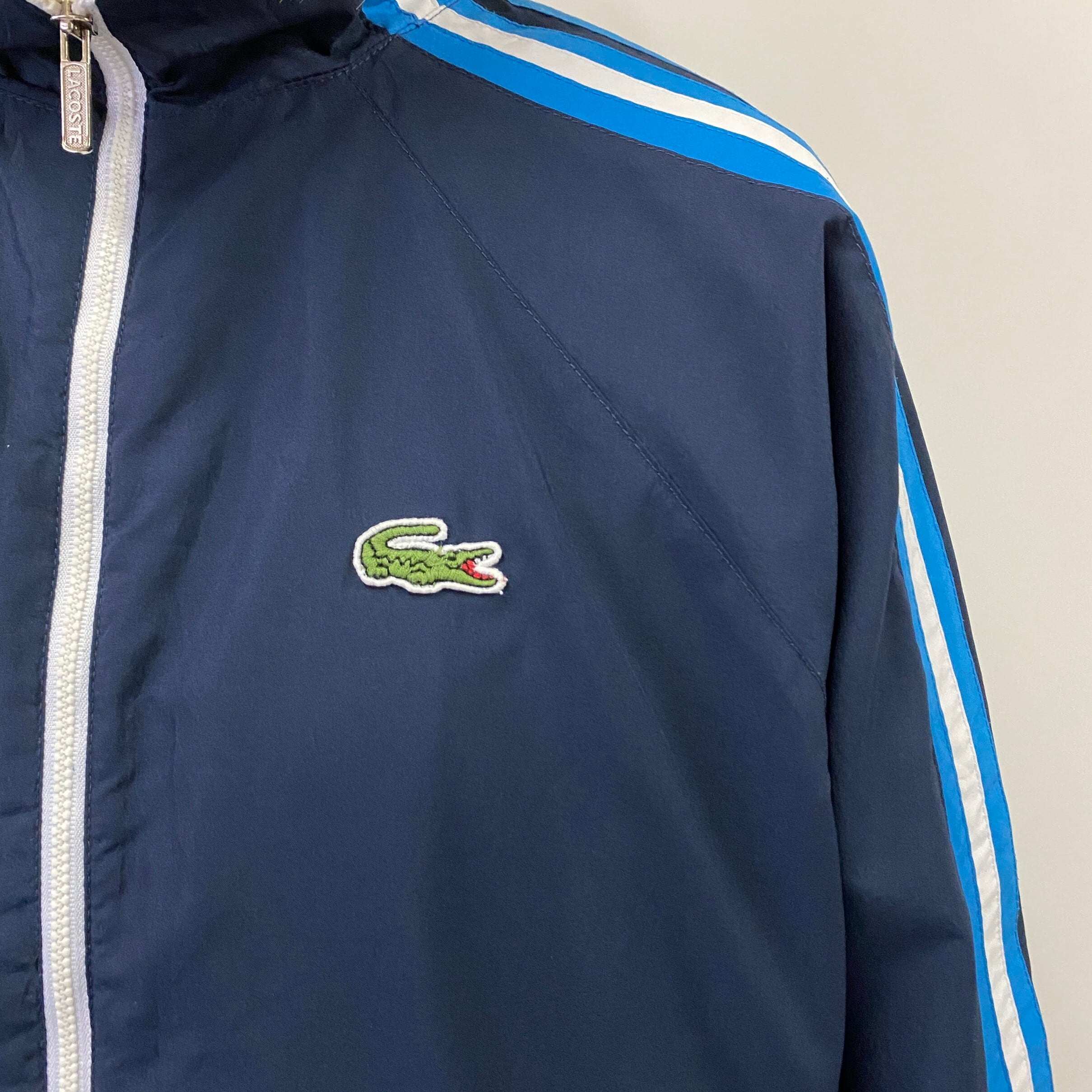 LACOSTE ラコステ ワンポイントロゴ刺? ライン スポーツジャケット メンズM相当 古着 スイングトップ ネイビー  紺【ジャージ・トラックジャケット】【HA10】 | cave 古着屋【公式】古着通販サイト