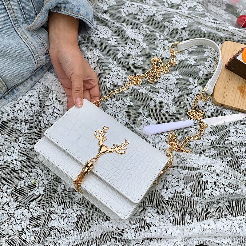 夏の小さなバッグ女性バッグ2020新しいトレンディなワイルドチェーンシングルショルダーメッセンジャーバッグinsファッション小さな正方形のバッグ Tiancai_Wing_Bag3035107