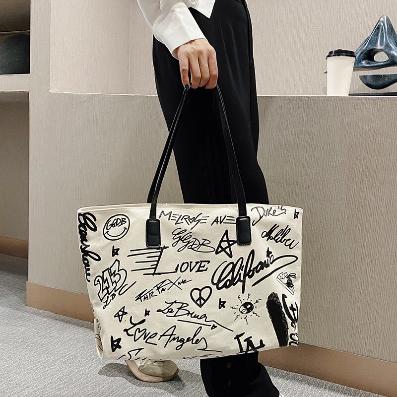 大容量キャンバスショルダーバッグ女性バッグ2020新しいトレンディなファッション野生の落書きバッグネット赤ポータブルトートバッグ Tiancai_Wing_Bag68076971320