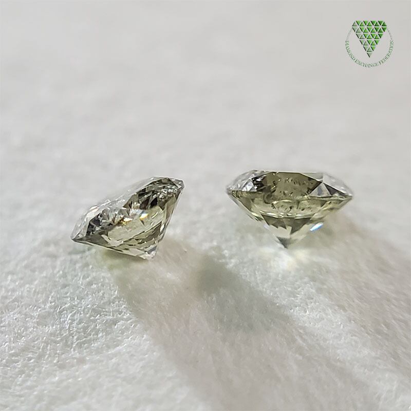 0.080 ct Fancy Light Greenish Yellow I1 CGL 0.093 ct Fancy Light