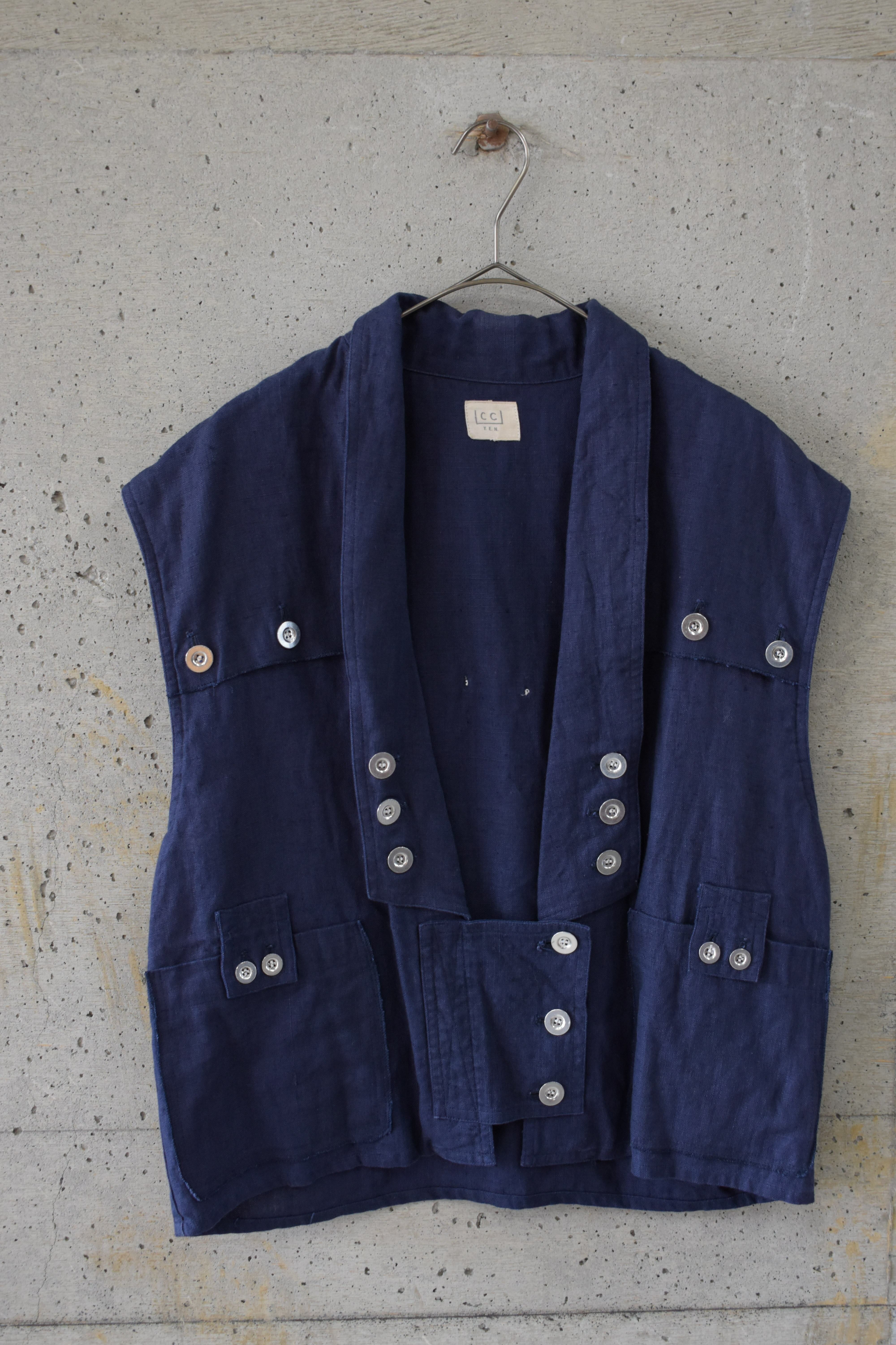 Vest with lots of buttons