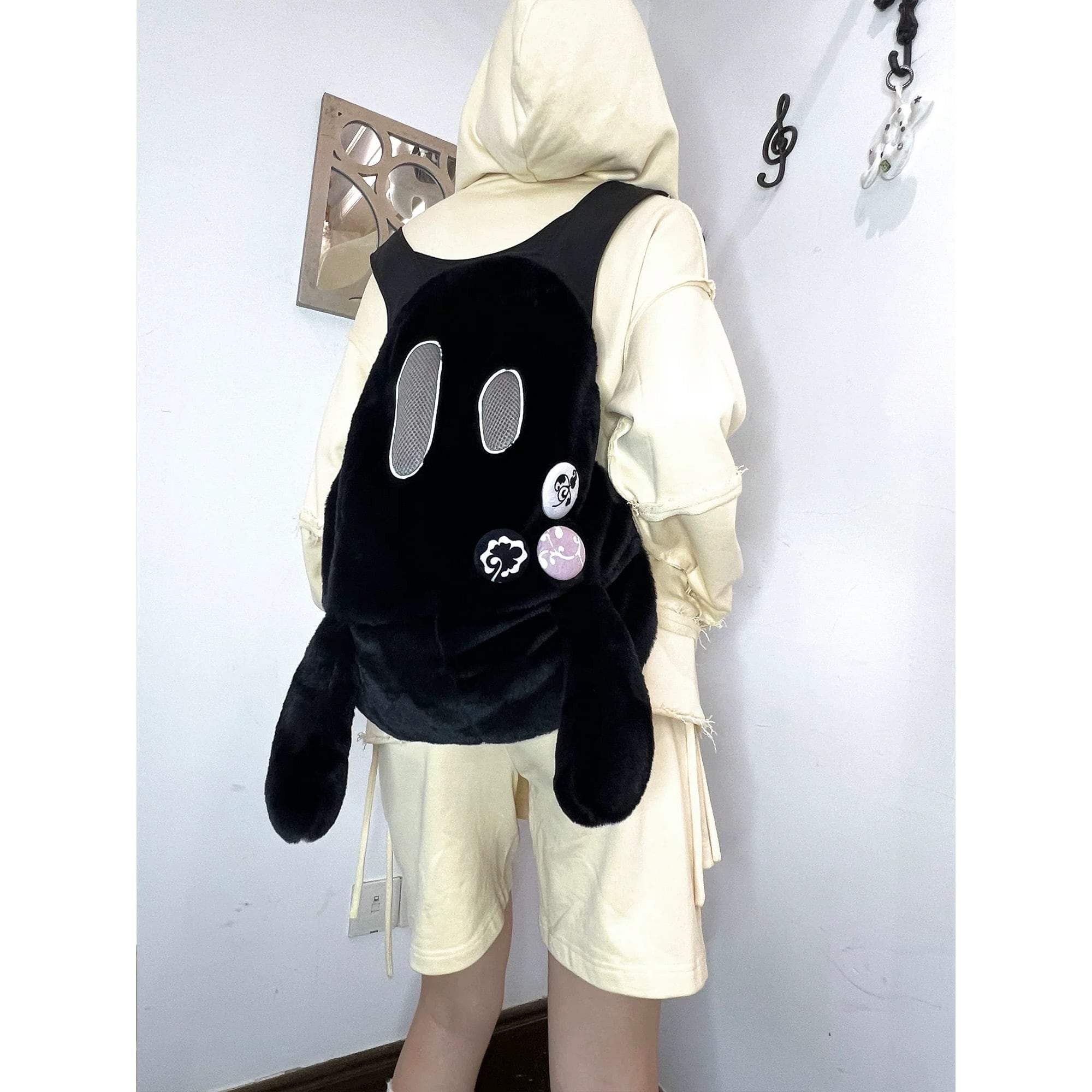 nit alcove] Cotton-filled black and white dual-shoulder backpack