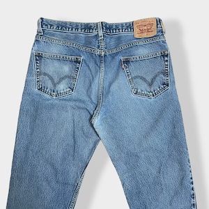 【LEVI'S】550 ジーンズ デニム ジーパン ワイドテーパード ジッパーフライ W36 L34 リーバイス ルーズ ダボパン ダメージ ジーンズ RELAXED FIT レソト製 US古着