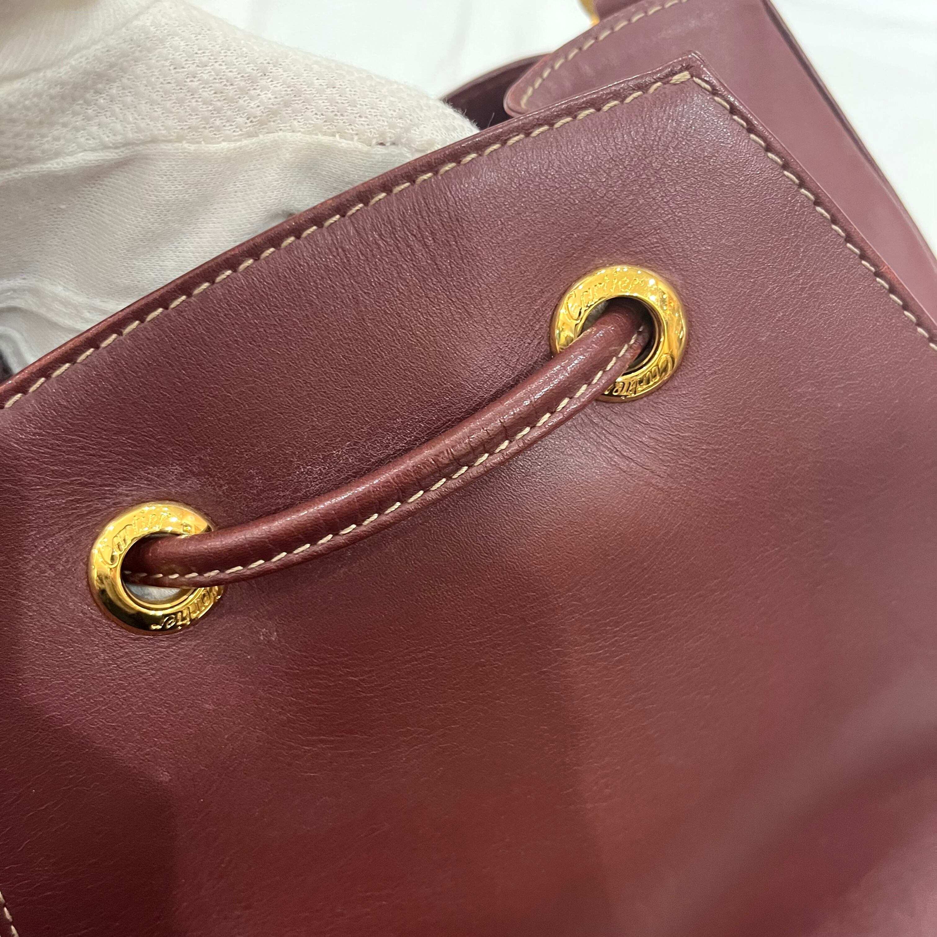 お値下げしました カルティエ 巾着 ショルダーバッグ レザー ボルドー 