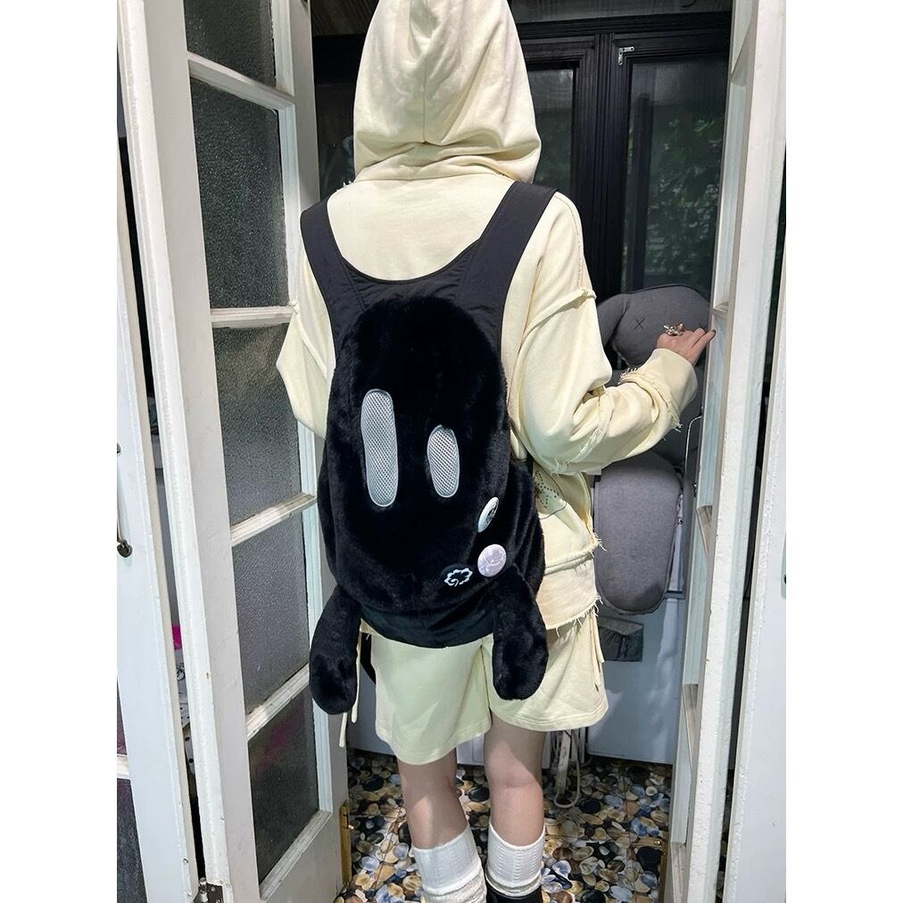 nit alcove] Cotton-filled black and white dual-shoulder backpack