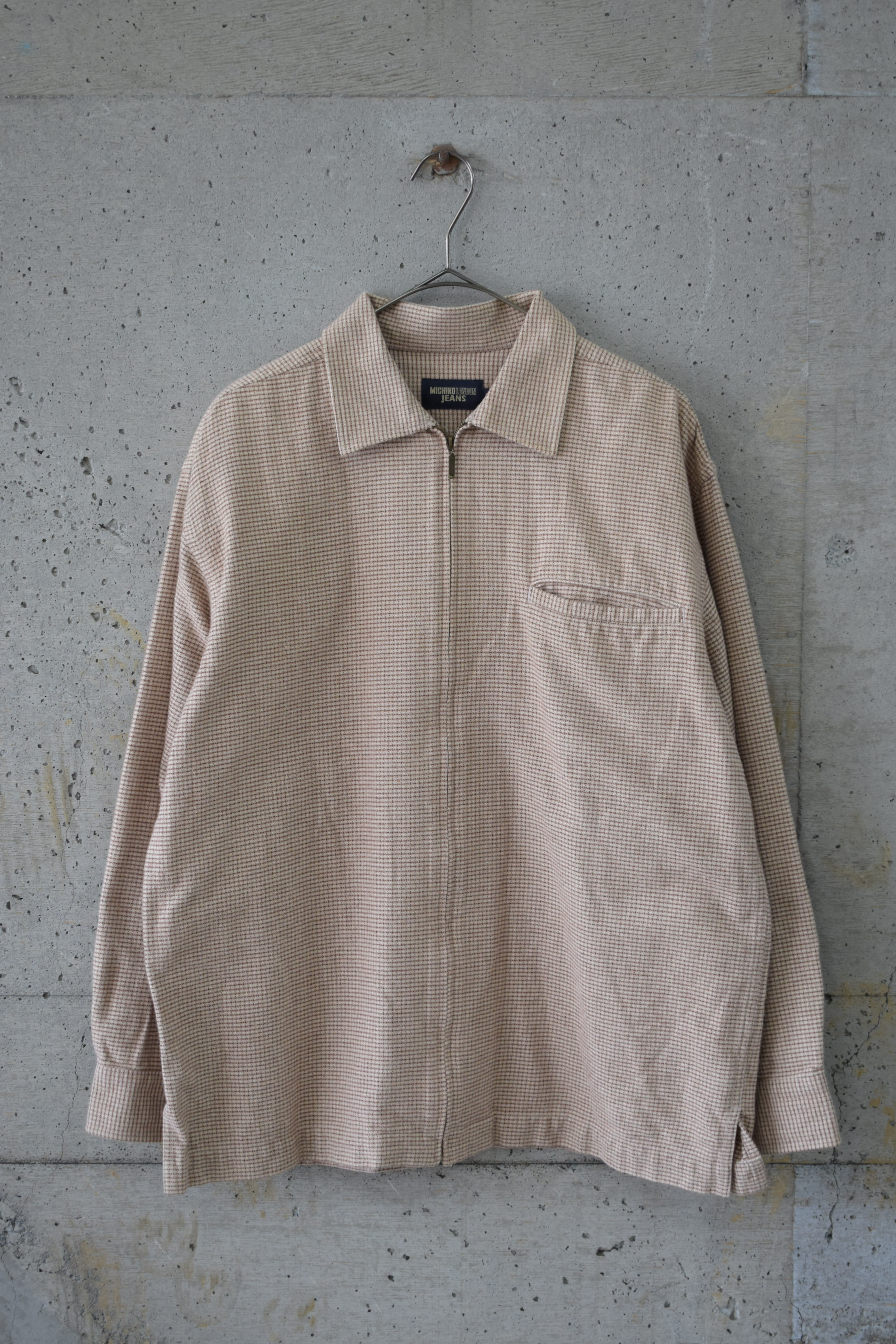 Brown-based check zip-up jacket