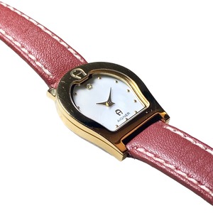 AIGNER horseshoe case × shell dial quartz watch “Verona”