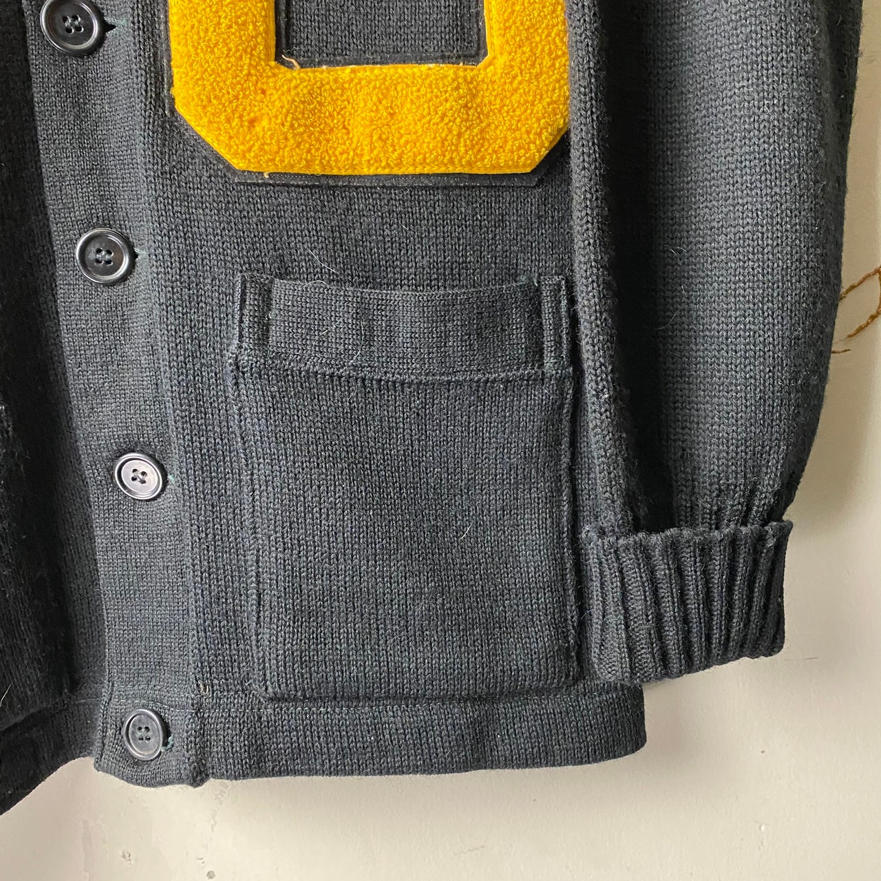 vintage 1960’s black lettered cardigan