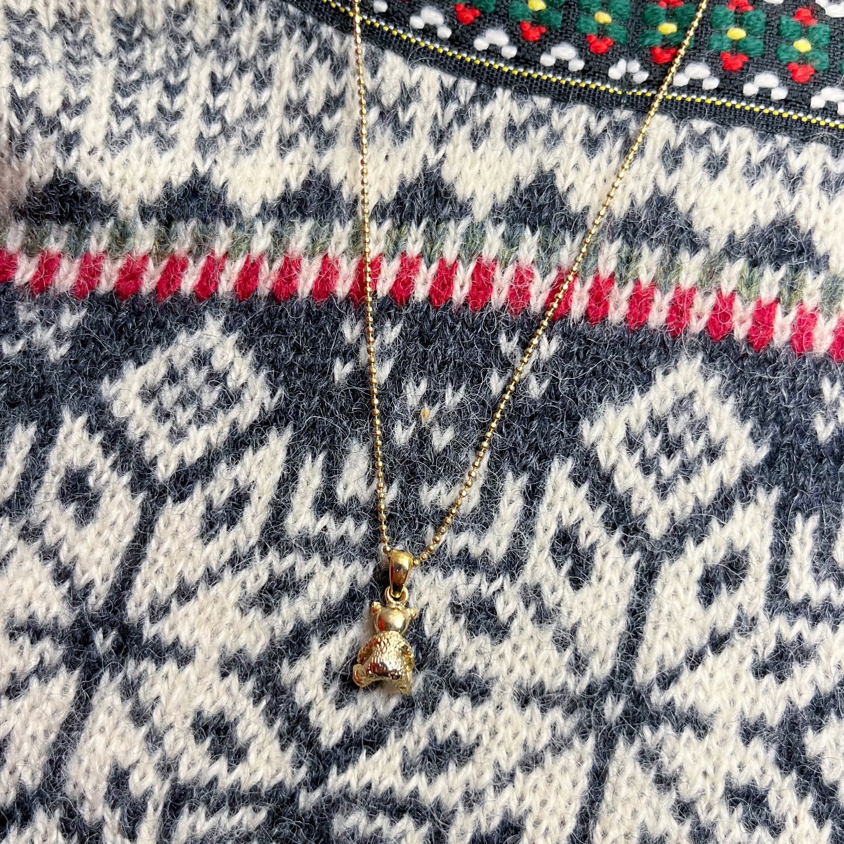 stone bear gold necklace