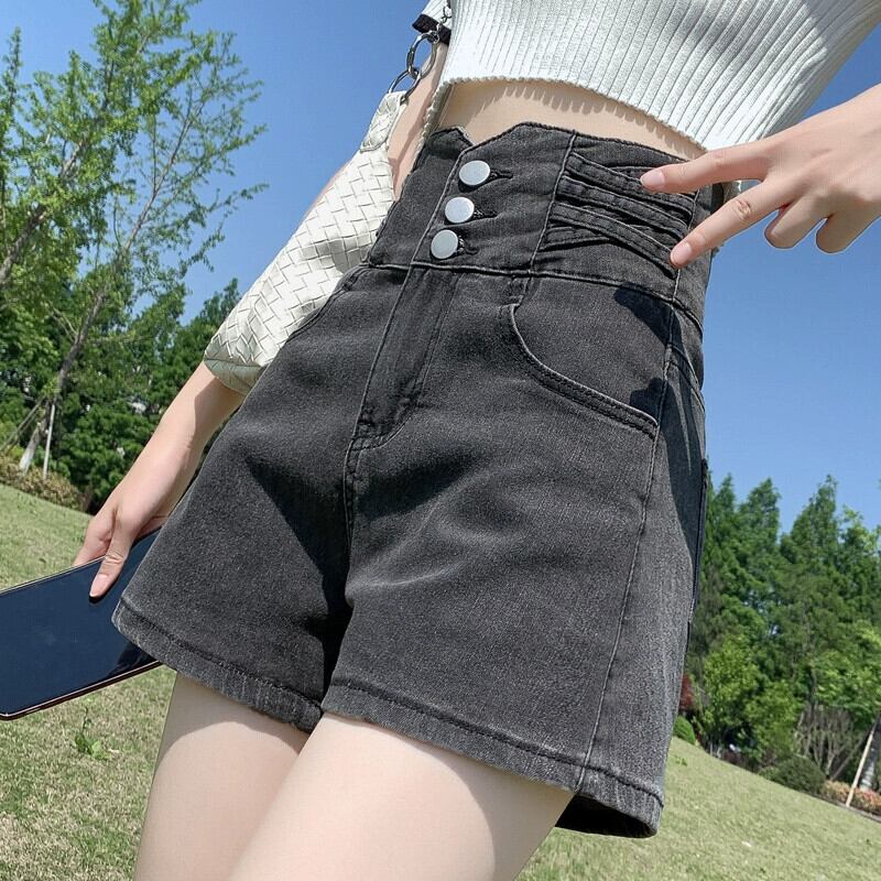 夏のヨーロッパとアメリカのネクタイデニムショートパンツの女性