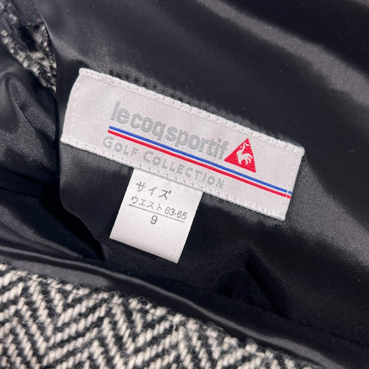 le coq sportif GOLF ルコックスポーツ ゴルフ ヘリンボーン ラップスカート 9/ブラック×ホワイト ウール混 レディース