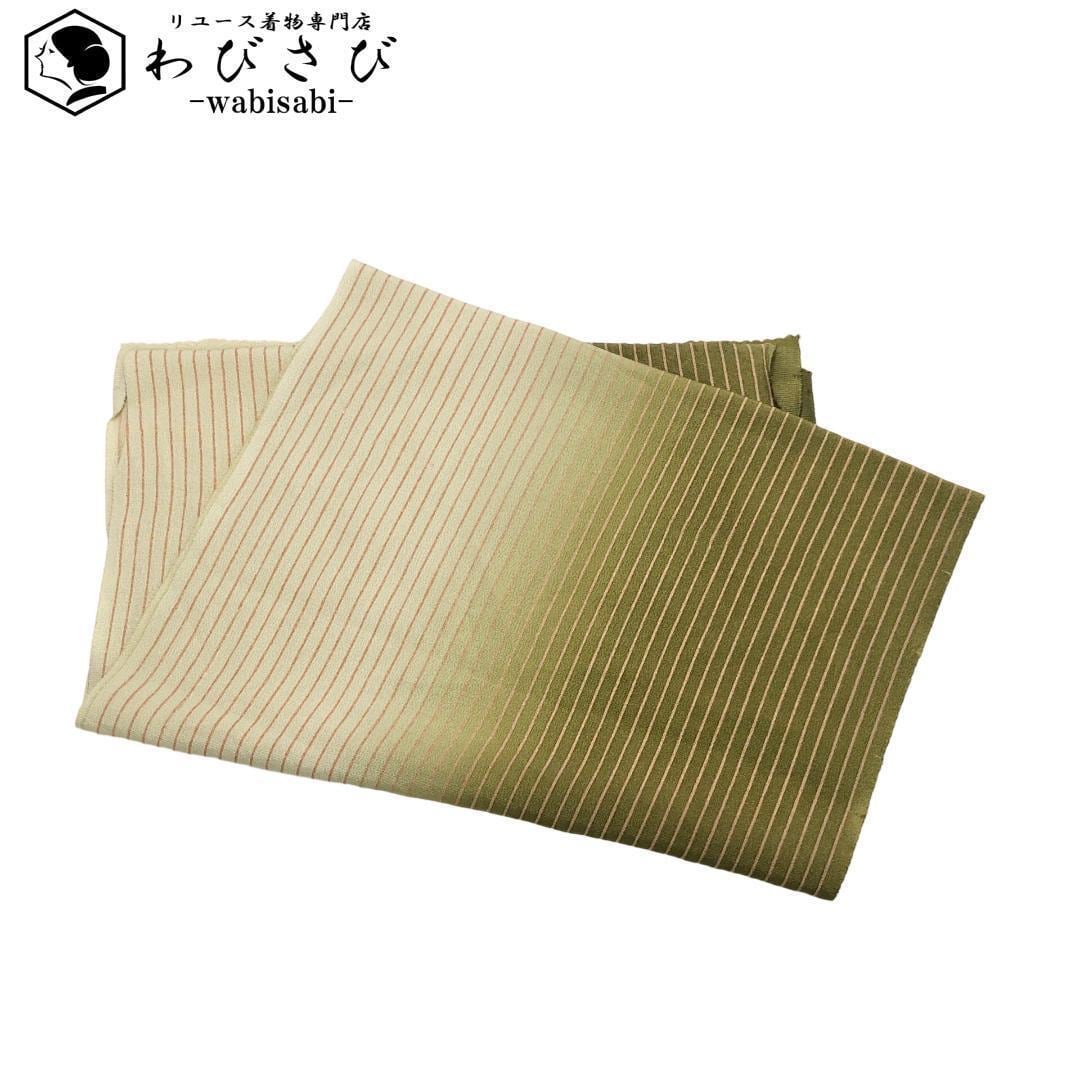 名古屋帯 美展作家 松本隆男 丸に鯉 花模様 縮緬 青褐色 O-5520 着物