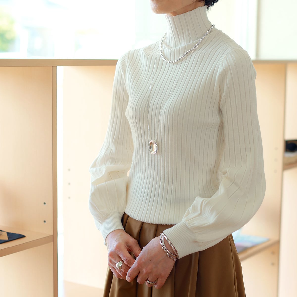 TOLNERA (トルネラ) セミバルーンスリーブ 細見えリブニット | planino