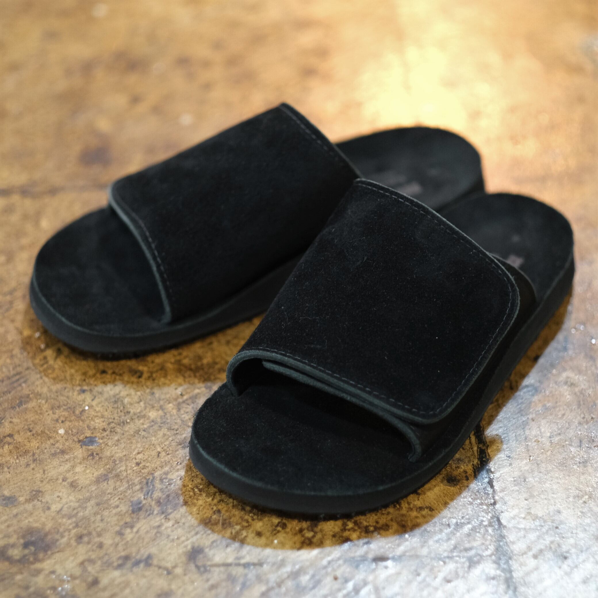black leather slide on sandals
