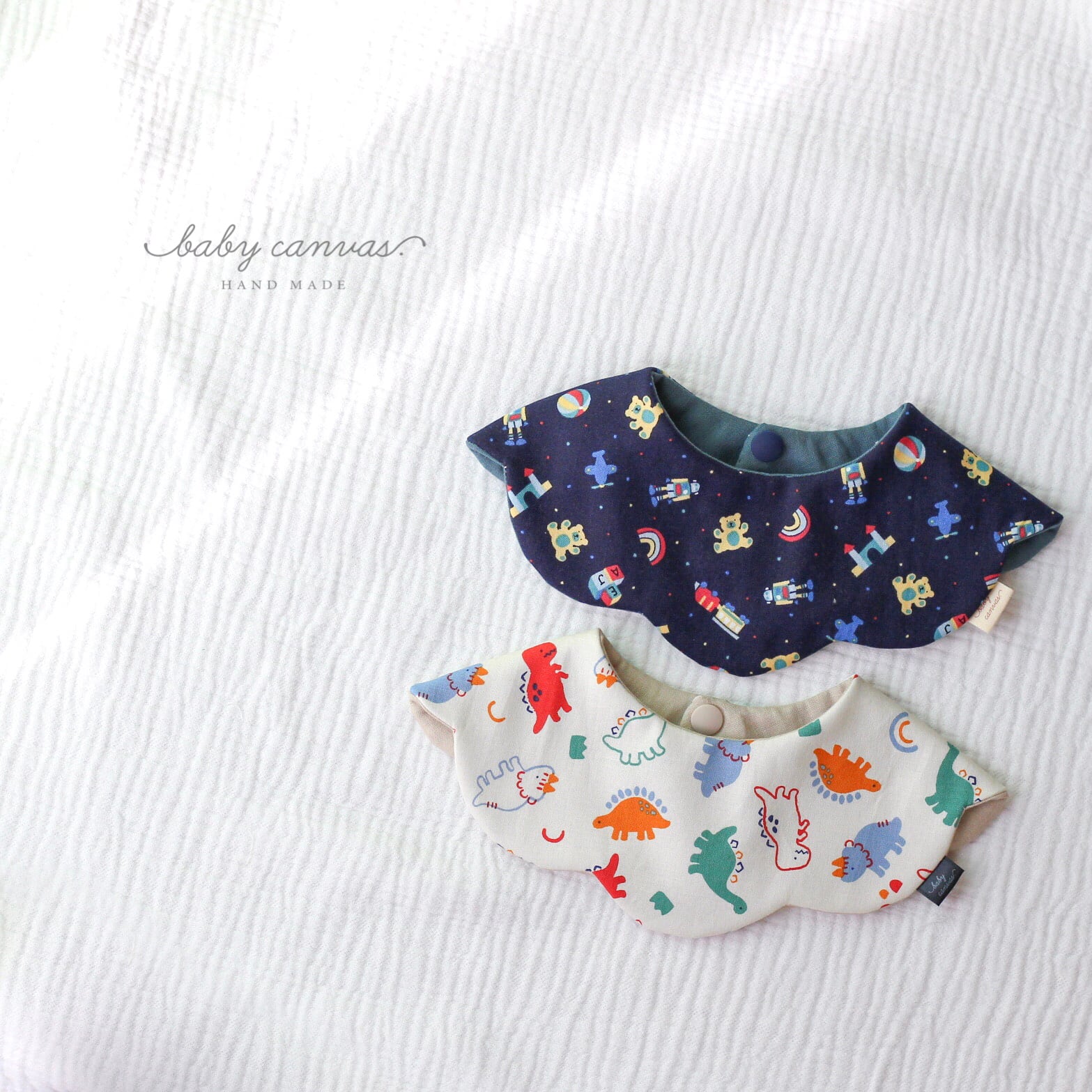 おもちゃ柄orカラフル恐竜まんまるスタイ | baby canvas. ハンドメイド