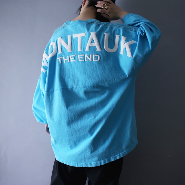 shoulder and sleeve switching mesh design back printed over silhouette souvenir l/s tee