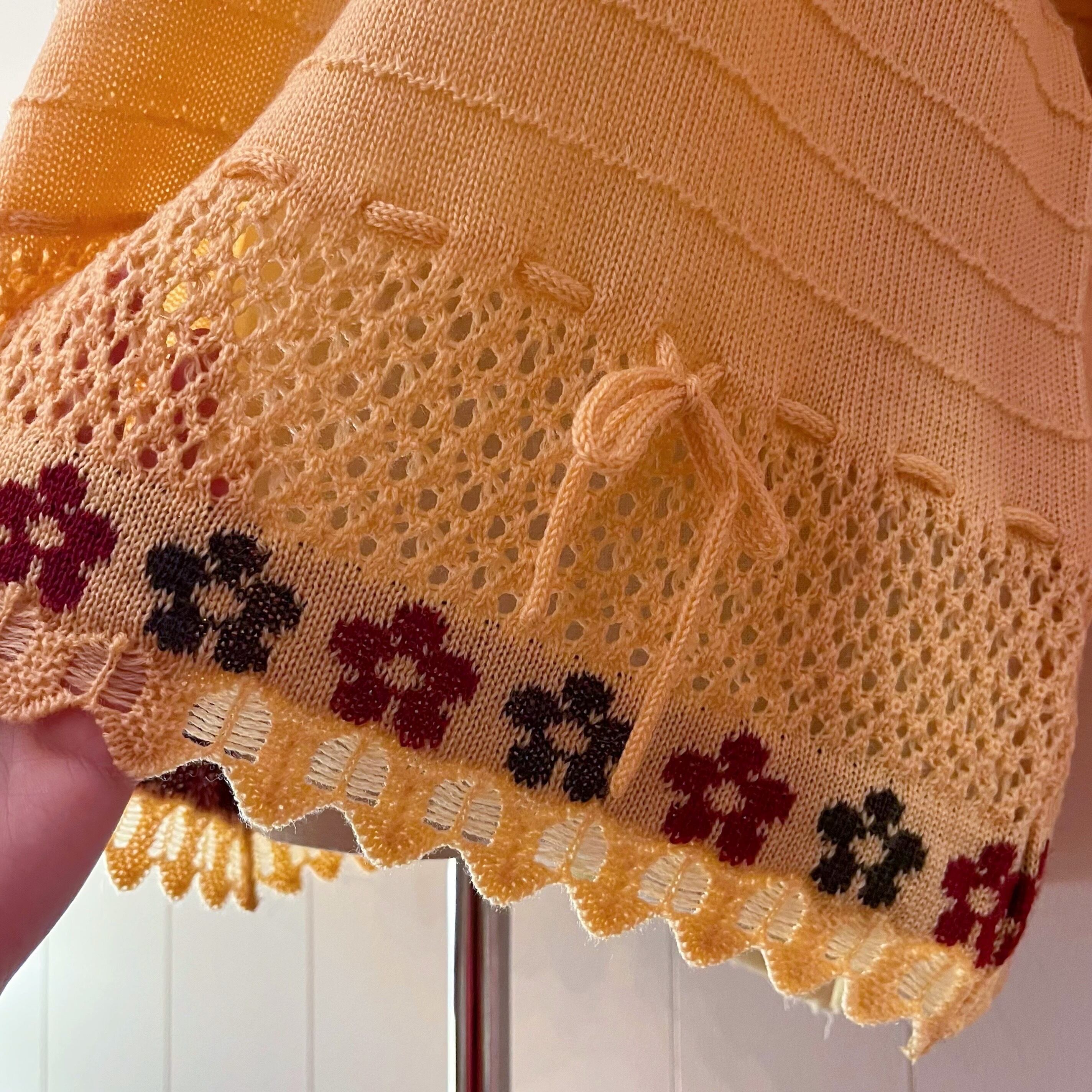 orange flower ribbon openwork knit sweater