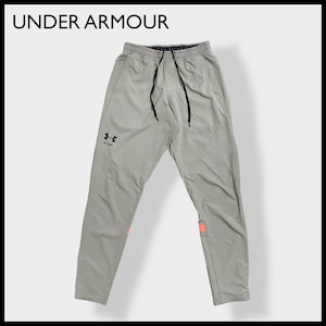 【UNDER ARMOUR】ウインドブレーカーパンツ トレーニングパンツ ジャージ ズボン 裾チャック 裾ジップ ポリエステル ロゴプリント M 蛍光色 アンダーアーマー US古着