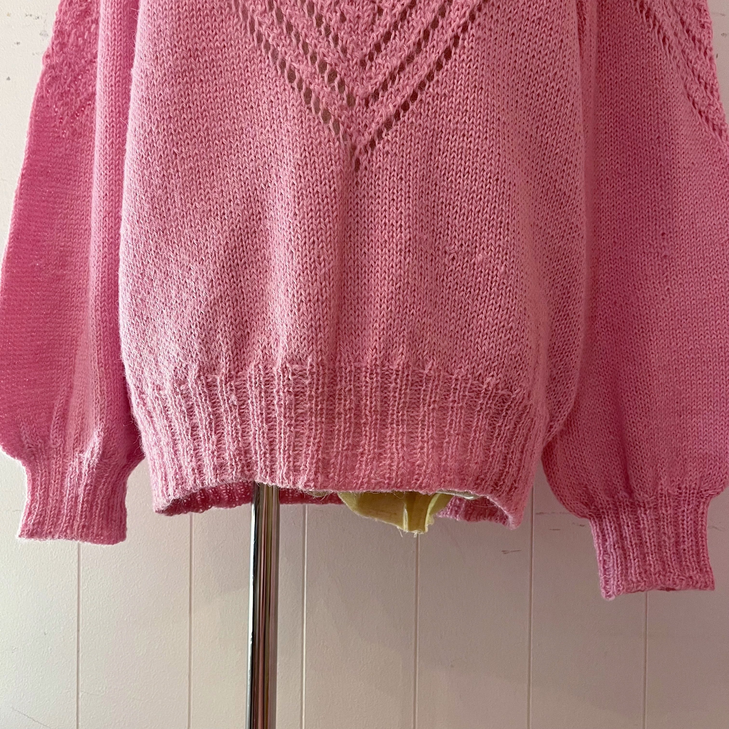 pink openwork knit sweater