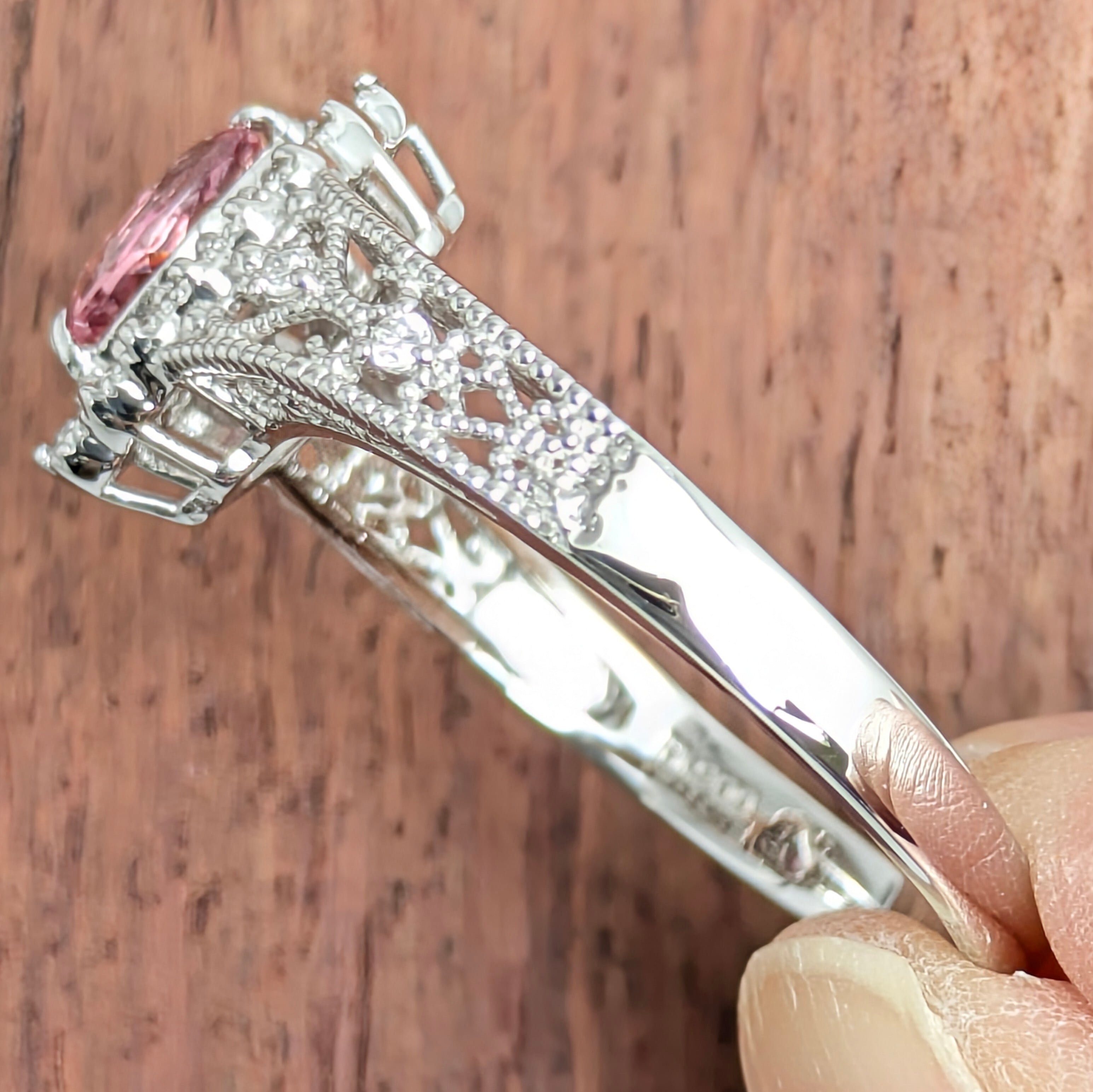 Pt900インペリアルピンクトパーズリング 0.45ct D 0.30ct【PRO208786