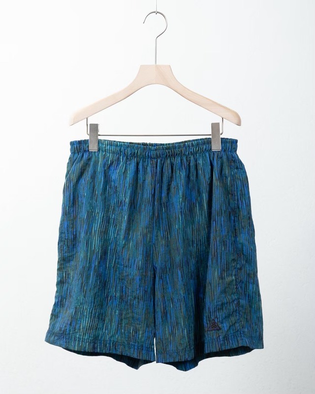 "NIKE ACG" abstract nylon shorts
