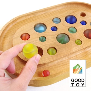 SPACE / A puzzle picking up marbles