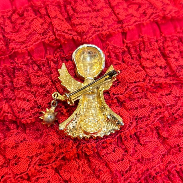 Christmas angle brooch