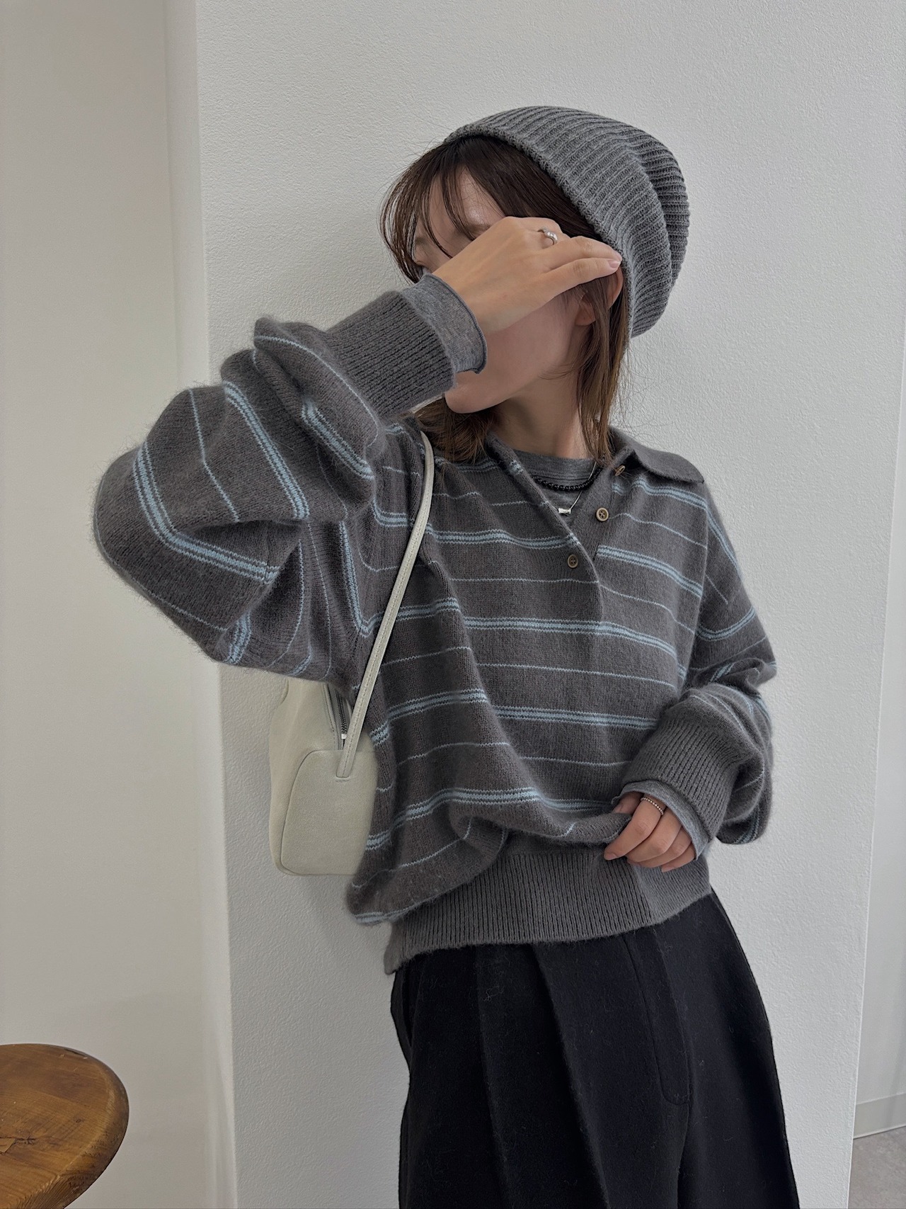 random border raccoon polo knit