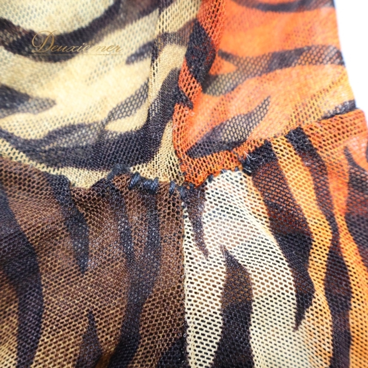 ベリーダンス 衣装 チョリ トップス ブラック系 クイーン Queen エジプト製 ゼブラ柄 模様 練習 レッスン 伸縮 ストレッチ 黒 橙 茶 派手 イベント ステージ かっこいい 華やか ブラウス 羽織り オレンジ系 ブラウン系