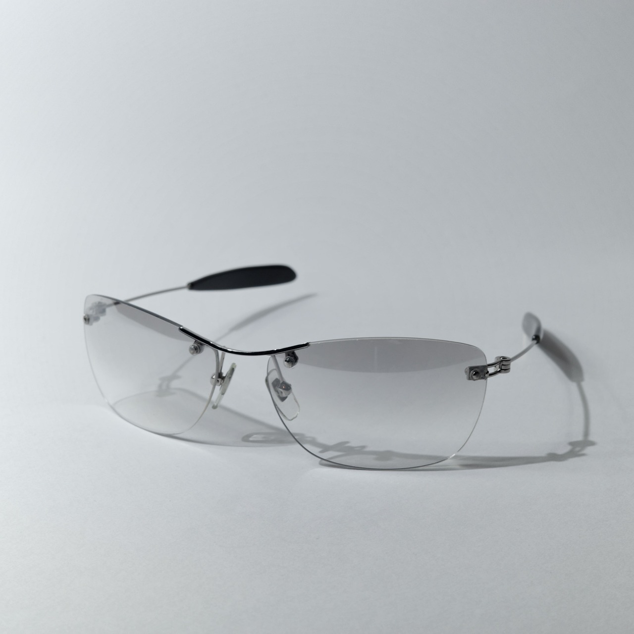 "DKNY" RIM LESS SUNGLASSES