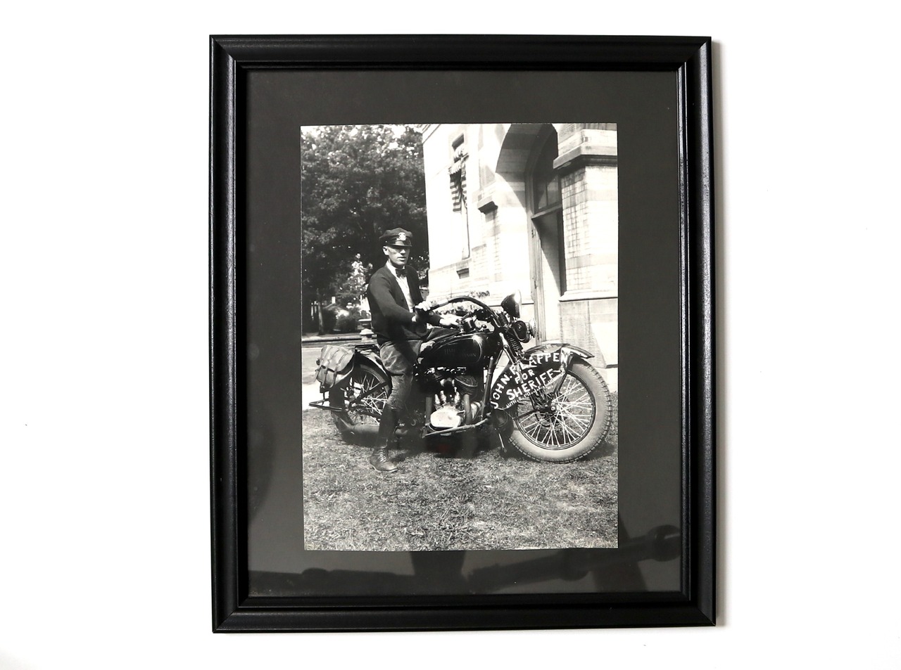 POLISE OFFCER ASTRIDE A HARLEY-DAVIDSON PHOTOGRAPH