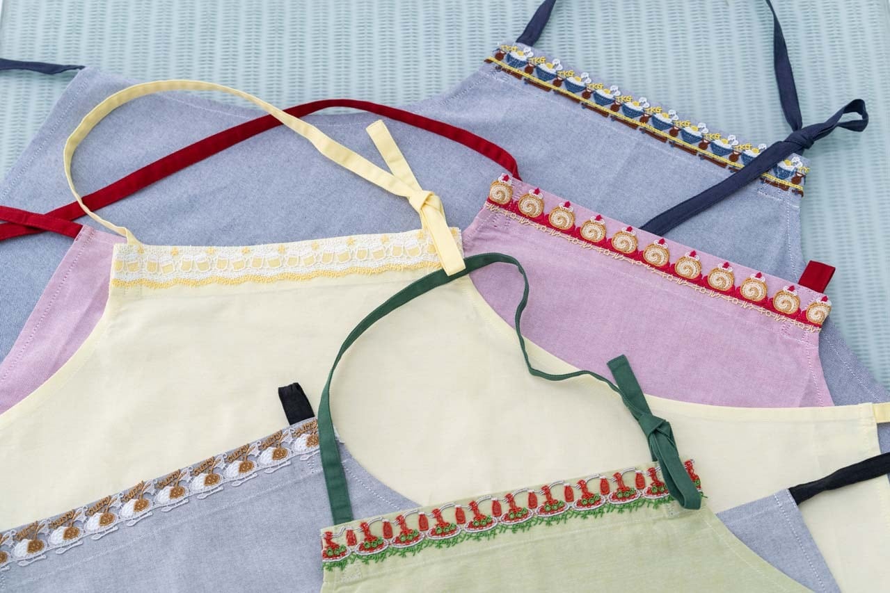 近沢レース店 コットンエプロン〈卵かけご飯〉〈ロールケーキ〉〈ビール〉〈ライスカレー〉〈ナポリタン〉