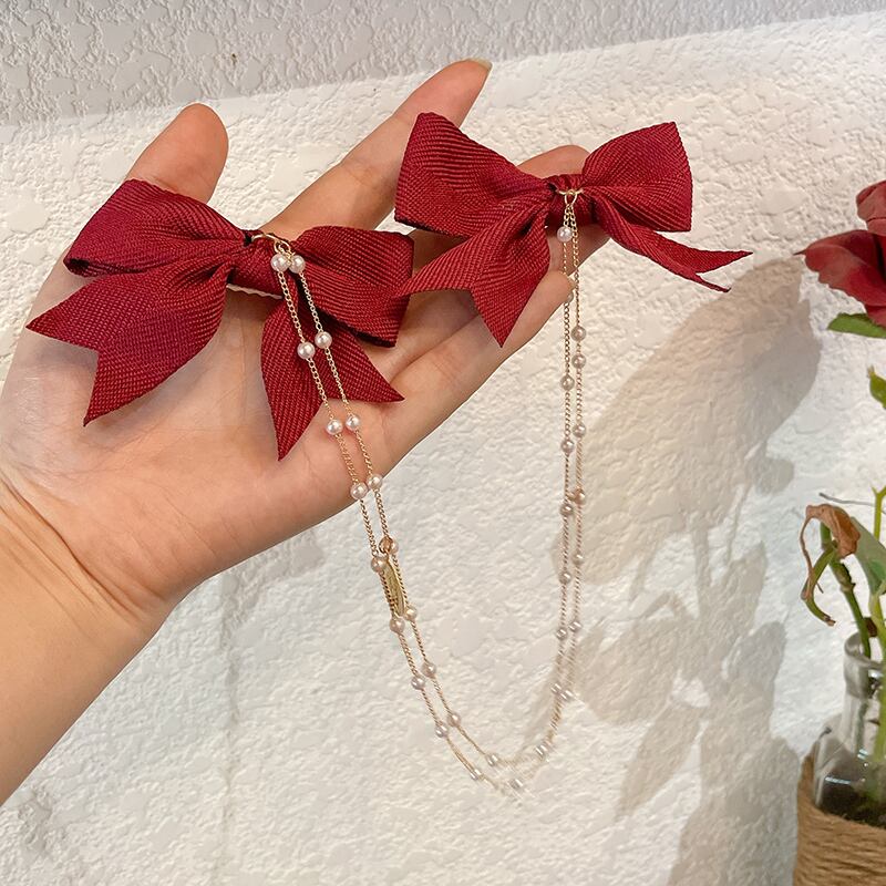 レッドリボンヘアピン パールサイドバックアクセサリー 真珠 ブラック・アイド・ピーズ84687344549