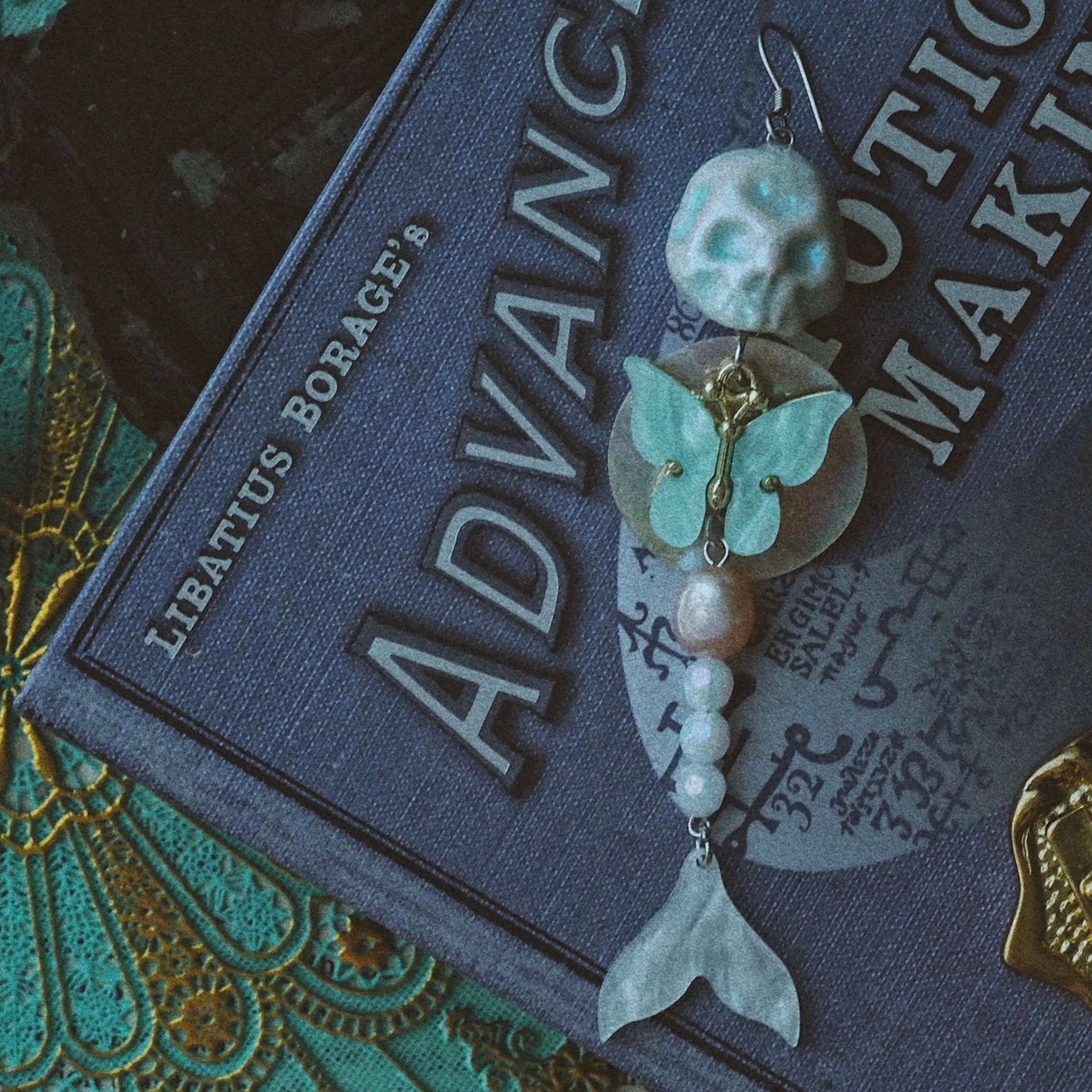 Mermaid remains and butterfly