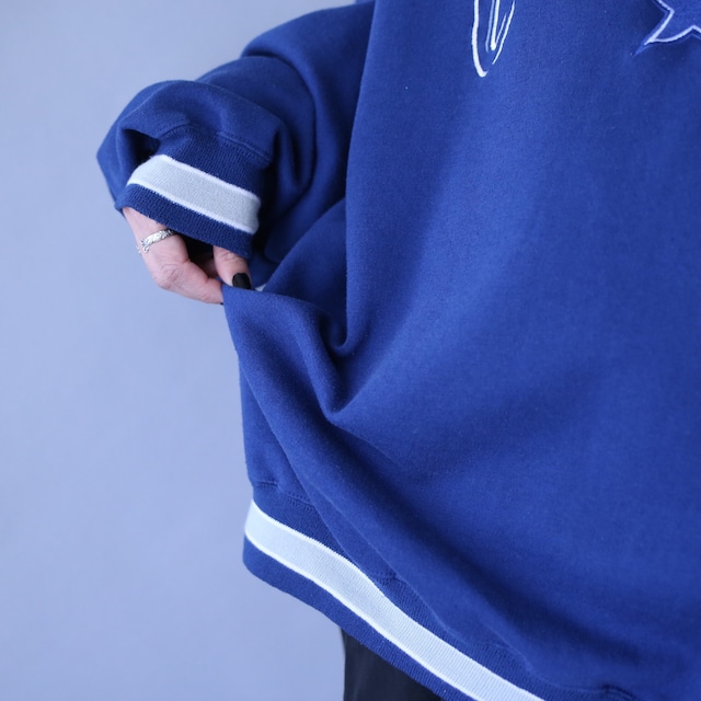 "刺繍" COWBOYS logo design over silhouette sweatshirt