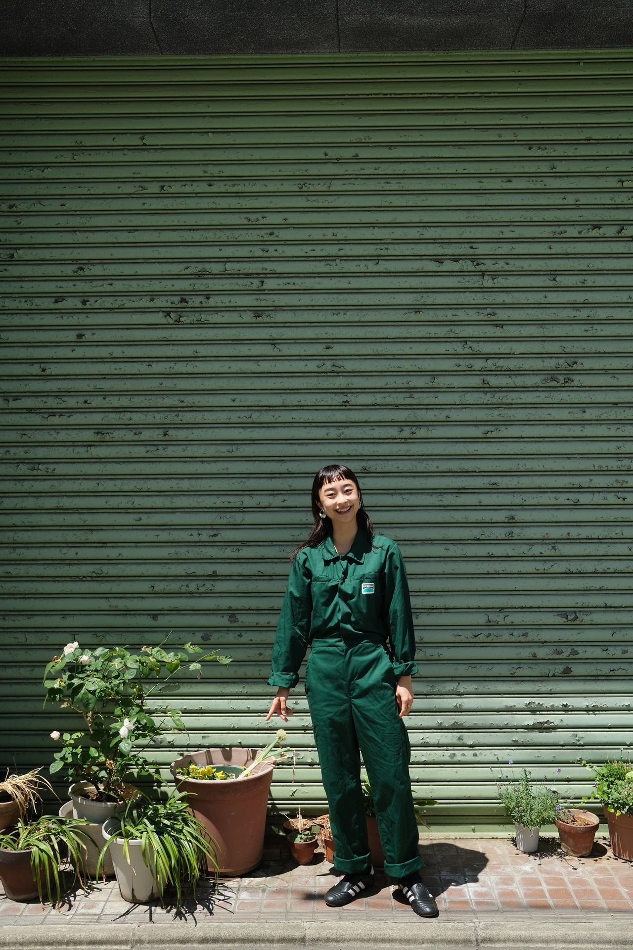 "Merial" green jump suit