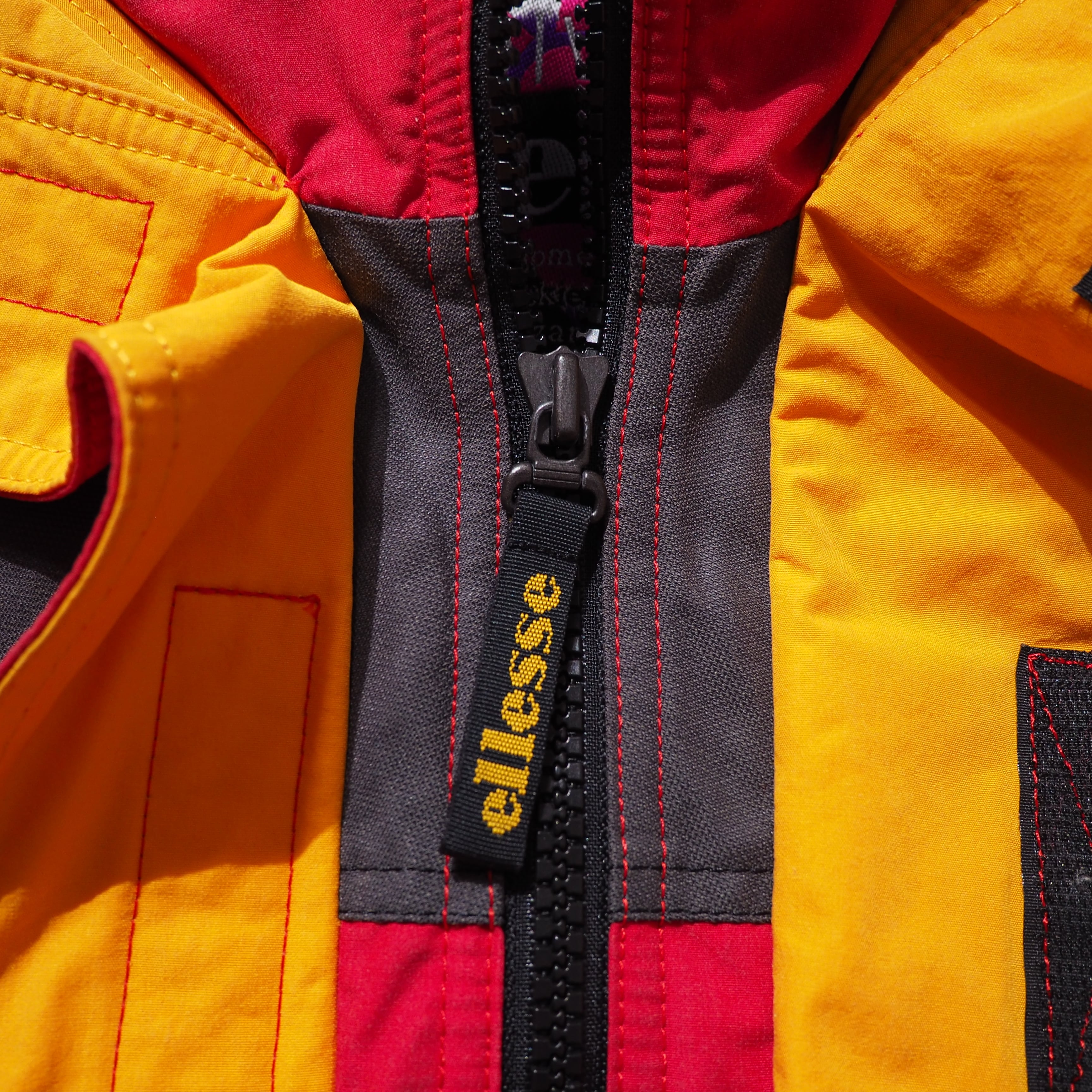 1980 - 90s ” ellesse ” Good multi color full zip vintage nylon jacket Parker
