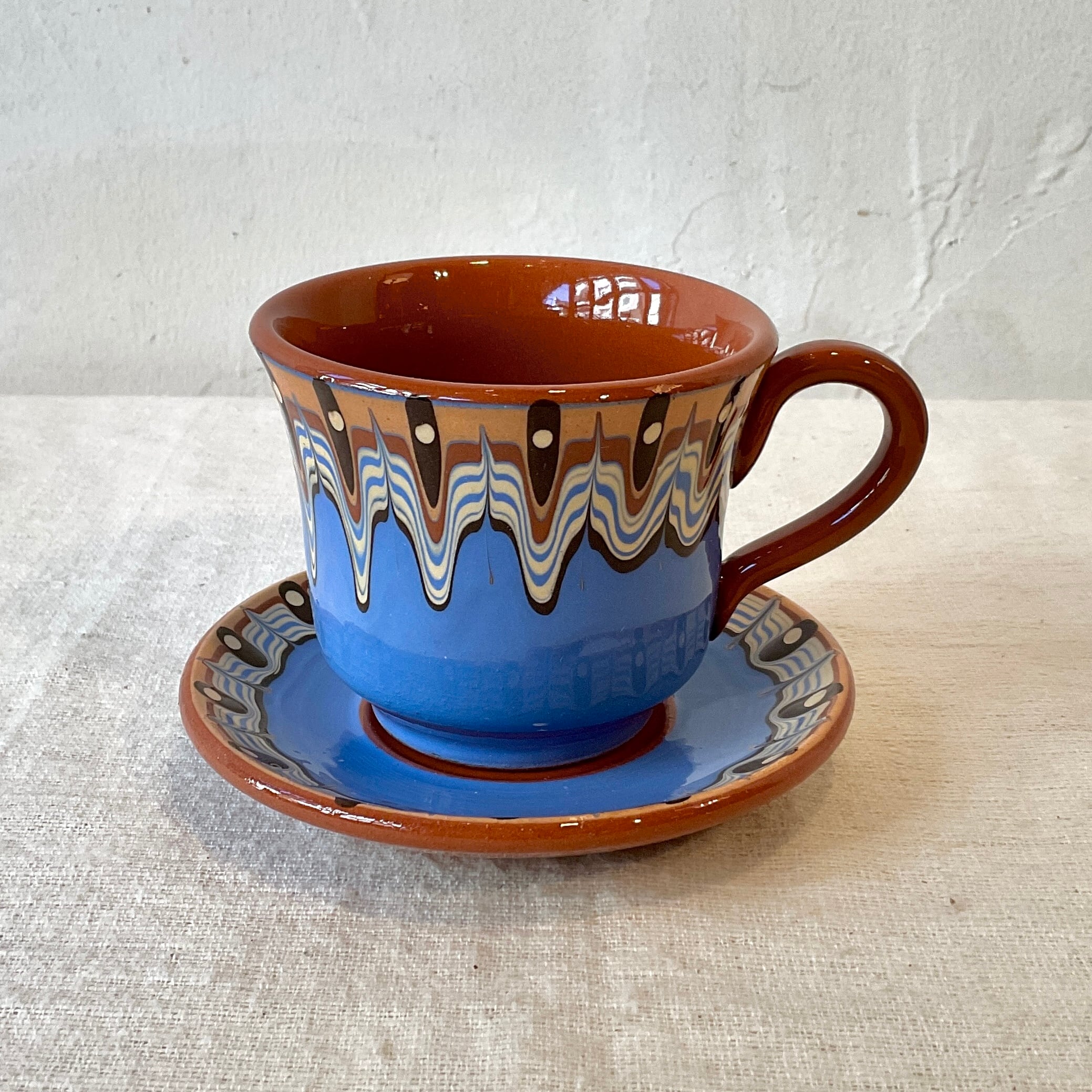 ブルガリア陶器】トロヤン陶器のカップ＆ソーサー（青・緑・黄