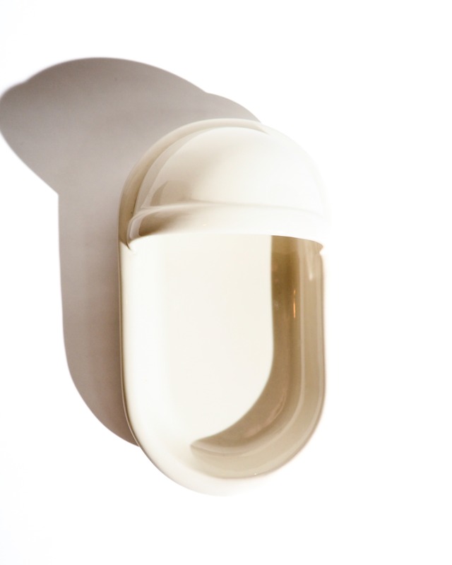 Ceramic container for a pit toilet