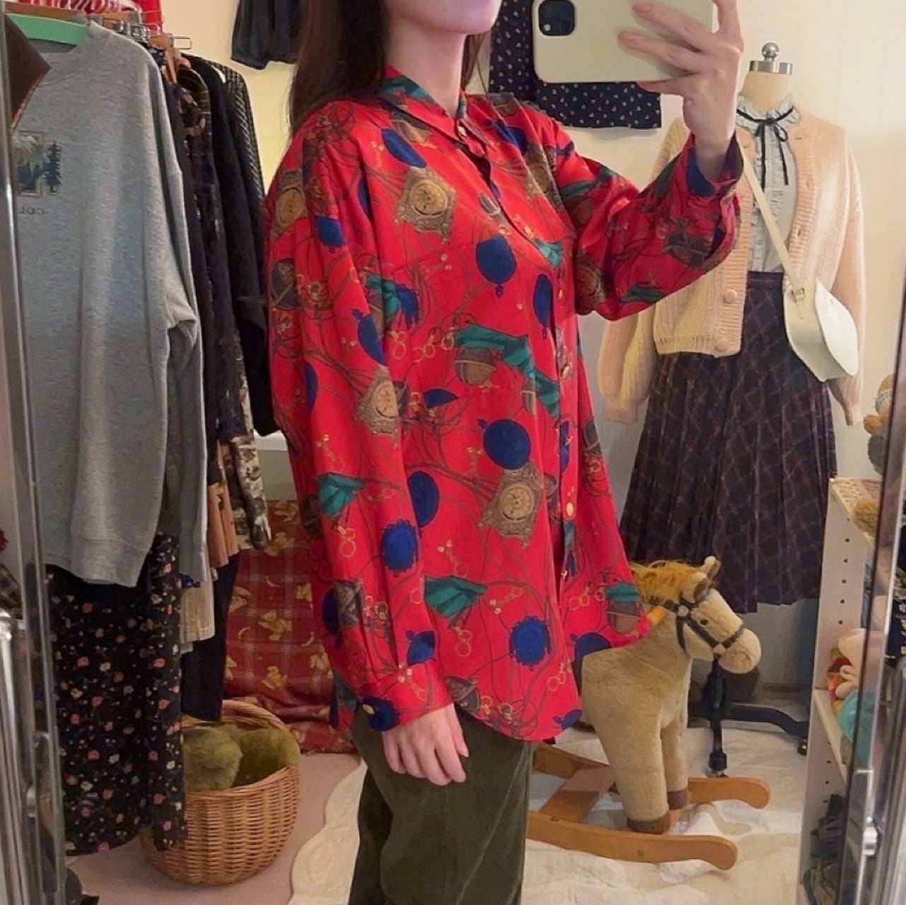 clock and globe red satin blouse