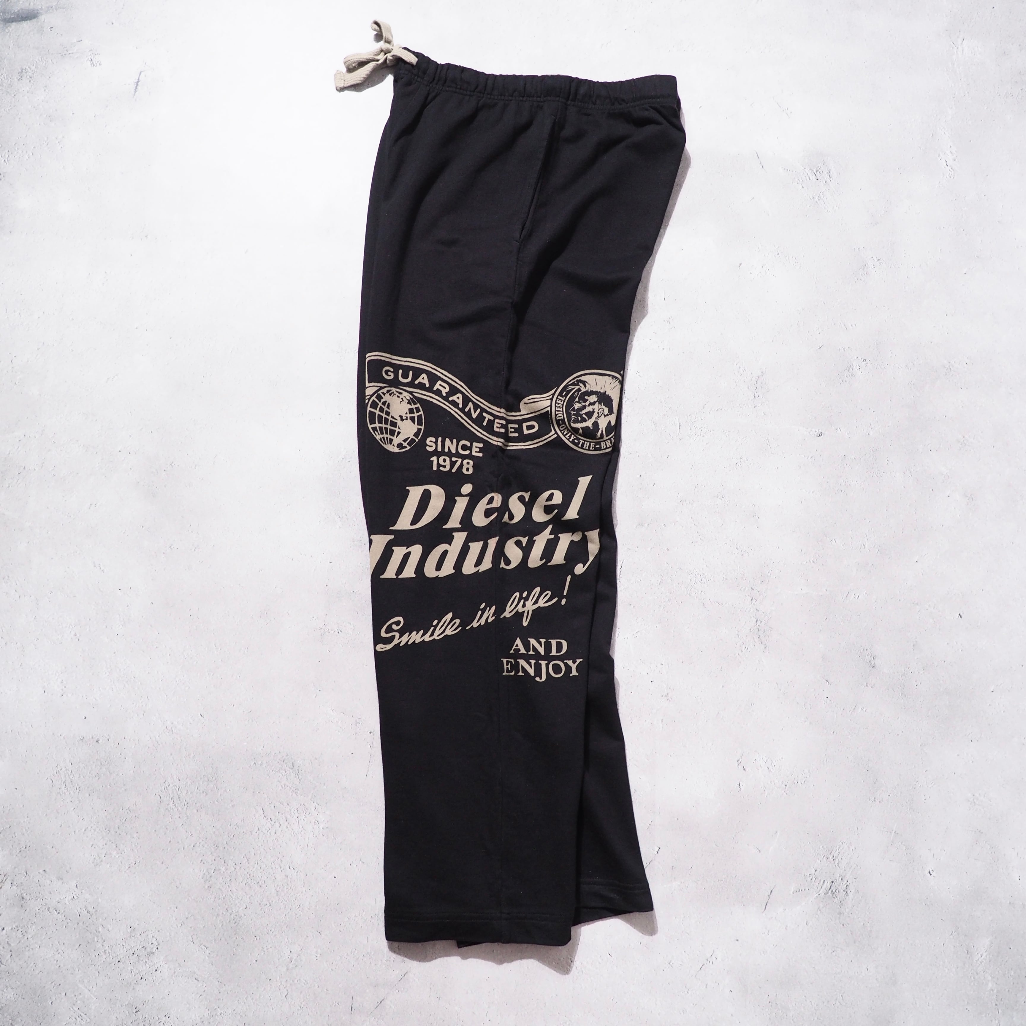 ” DIESEL ” Graphic logo printed wide Sweat pants