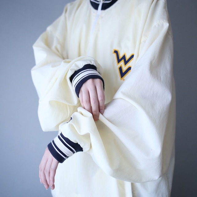 "Champion" over silhouette half-zip nylon pullover